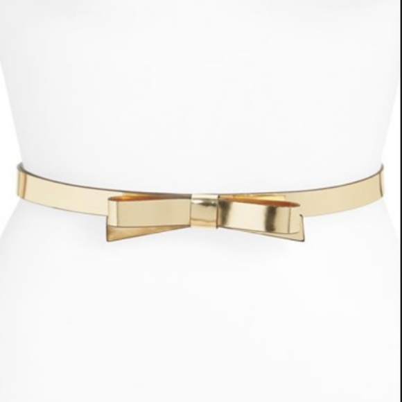 kate spade Accessories - Kate Spade skinny leather bow belt in gold
